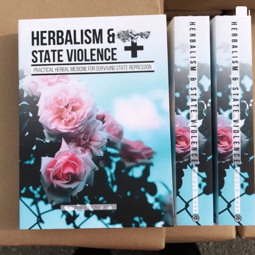 Image shows three copies of Nicole Rose's book 'Herbalism and state violence'
